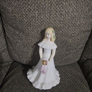 Charming White Figurine with Blonde Hair